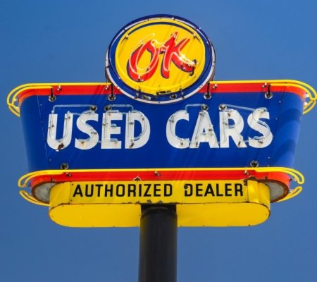 used car sign at a dealership